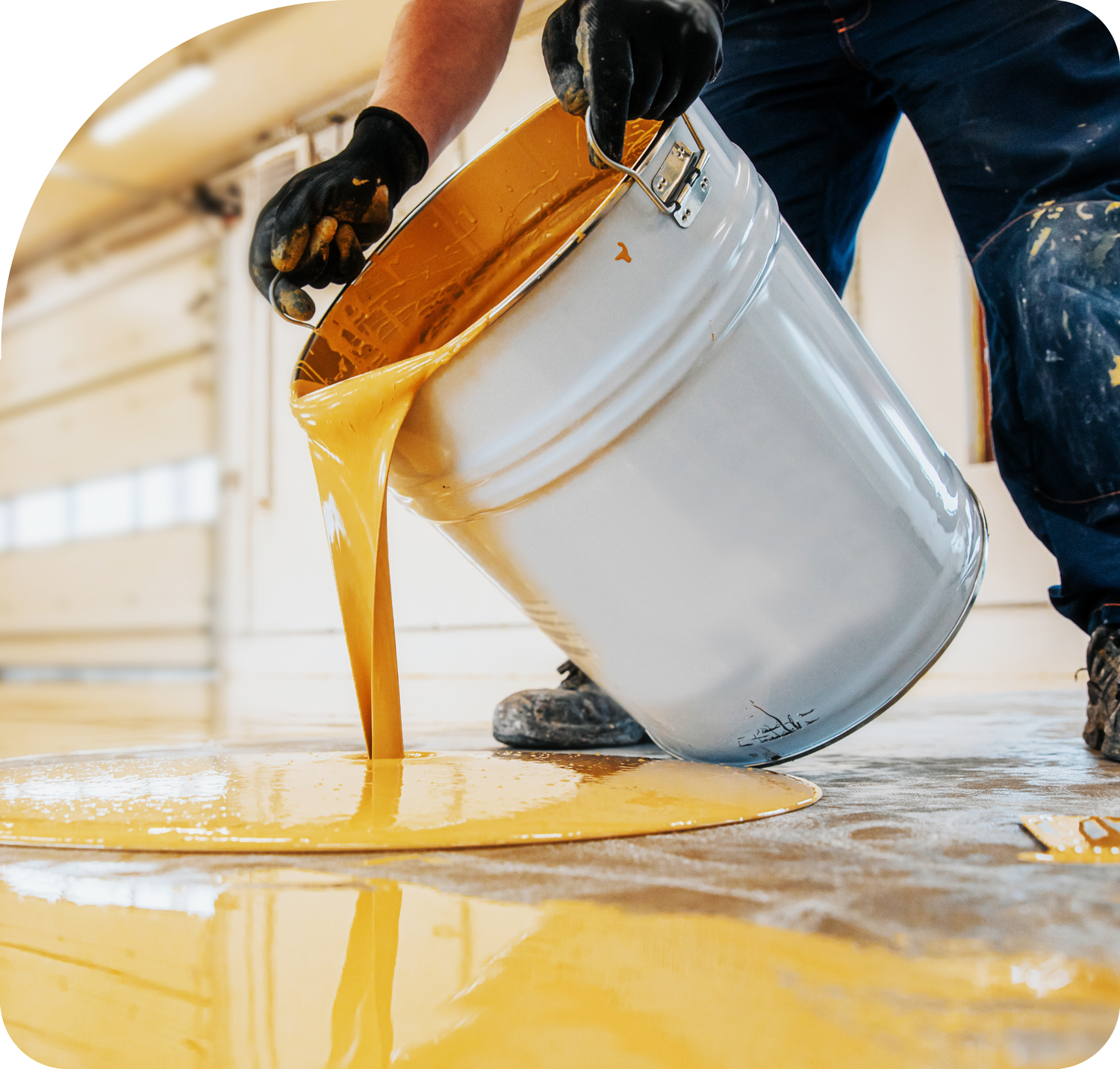 man pouring bucket